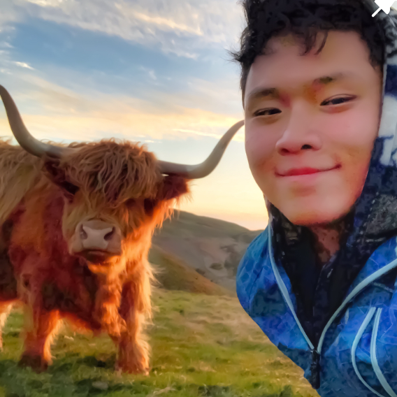 Picture of Dan Xia with a bull